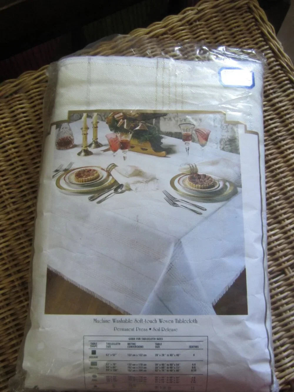 NWT/Tablecloth 60x120 with Gold and Silver Glitter Woven throughout.